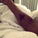 Justin Bieber Wildcard Tattoo arm